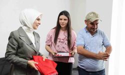 Engelli kardeşlerine ömrünü adayan Çilem'e ev tapusu teslim edildi